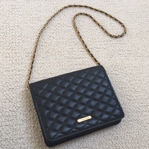 Vintage soft Leather quilted bag. Black gold chain